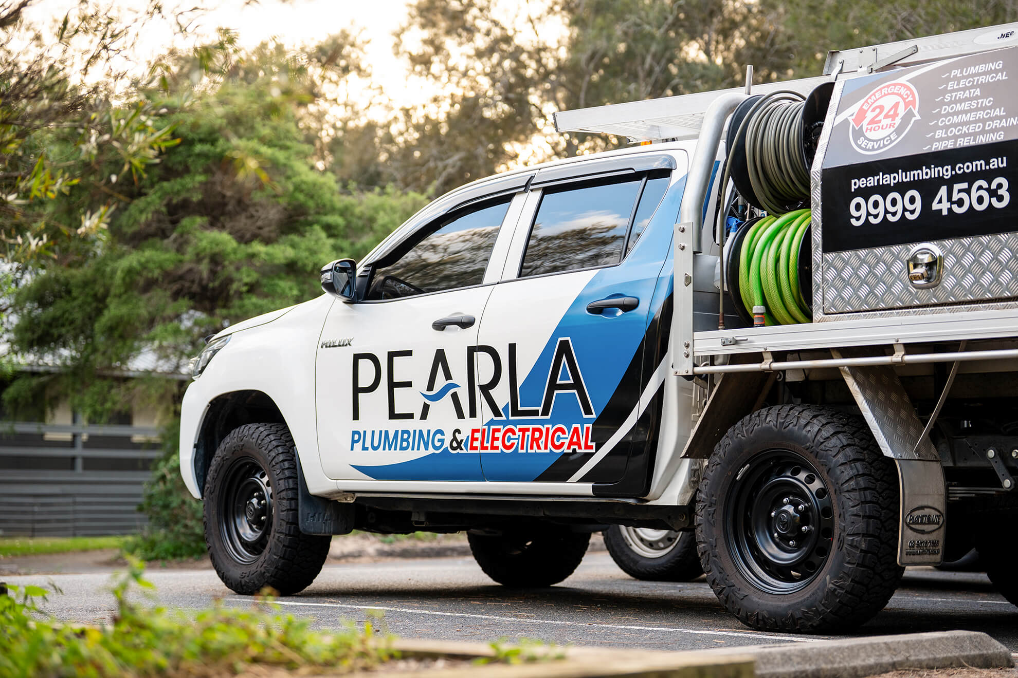 a Pearla professional plumber car in sydney