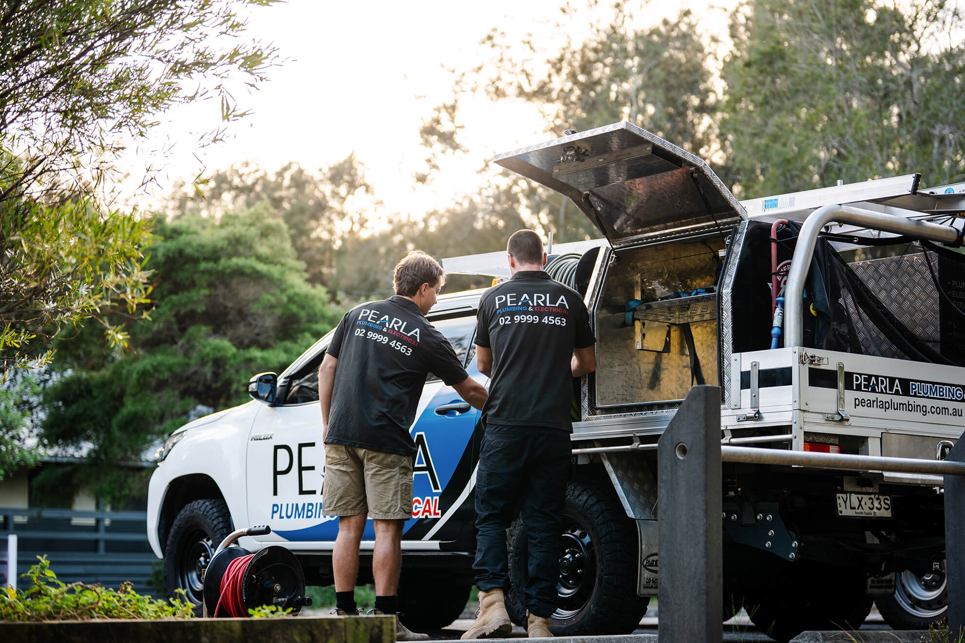 two Pearla professional emergency plumbers ute in sydney