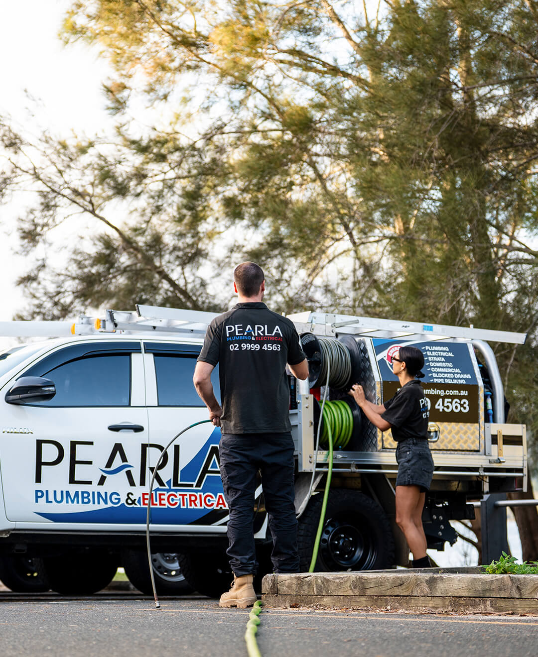 two Pearla professional plumbers in sydney